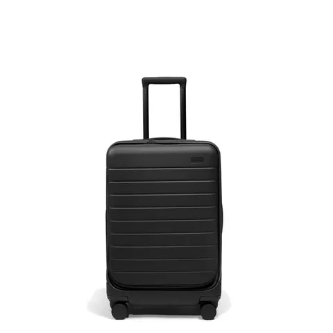 Away static image ad: Away isn't just suitcases. It's a system built for however you travel. Topside Bigger Carry-On in Jet Black is a good place to start.