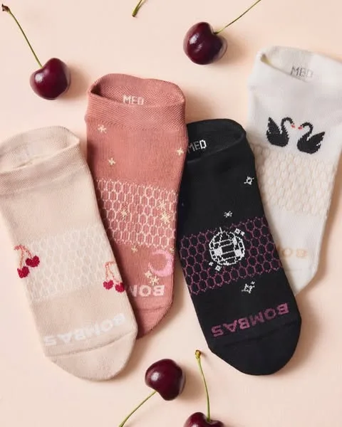 Bombas static image ad: You’re invited to our disco party. 4 pairs of blister-fighting ankles socks with disco balls, swans, cherries, and moonlight.